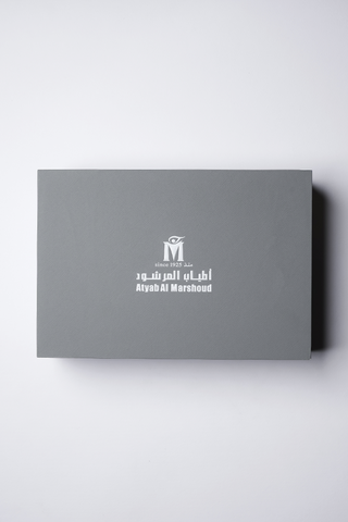 Gray box with a logo and text on a white background by Atyab Al Marshoud.