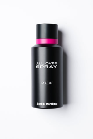 Black spray bottle labeled 'All Over Spray Lychee' on a white background by Atyab Al Marshoud.