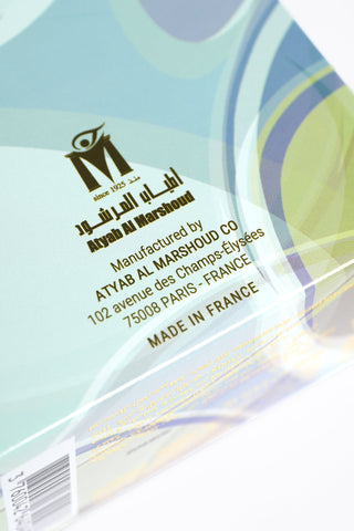 Product packaging with branding and manufacturing information on a white background by Atyab Al Marshoud.