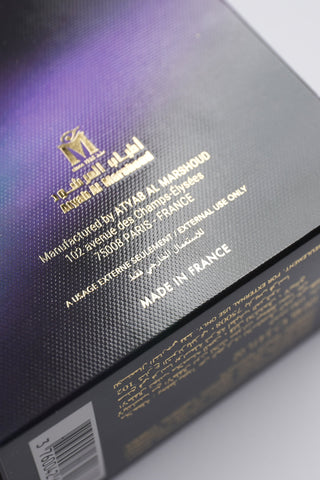 Close-up of a product packaging with text and branding on a purple and black backgroundby Atyab Al Marshoud.