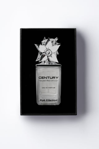 Perfume bottle with 'Century' packaging on a white background