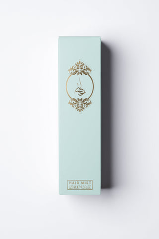Light blue box with gold design and text on a white background by Atyab Al Marshoud.