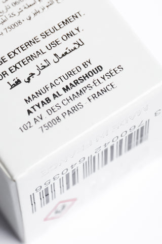 Product packaging with text and a barcode on a white background by Atyab Al Marshoud.