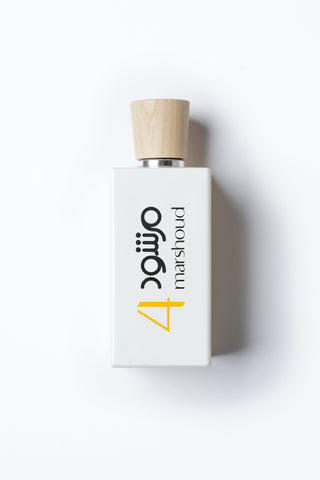 Marshoud4 White bottle with wooden cap on a white background by Atyab Al Marshoud.