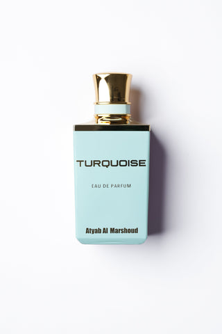 Perfume bottle labeled 'Turquoise' by Atyab Al Marshoud on a white background.
