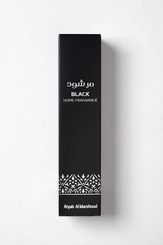 Black home fragrance box with white text and design on a white background by Atyab Al Marshoud.